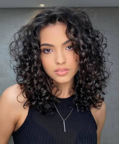 Curly Hair, Don’t Care: 15 Trendy Haircut Styles For Medium Length Curls